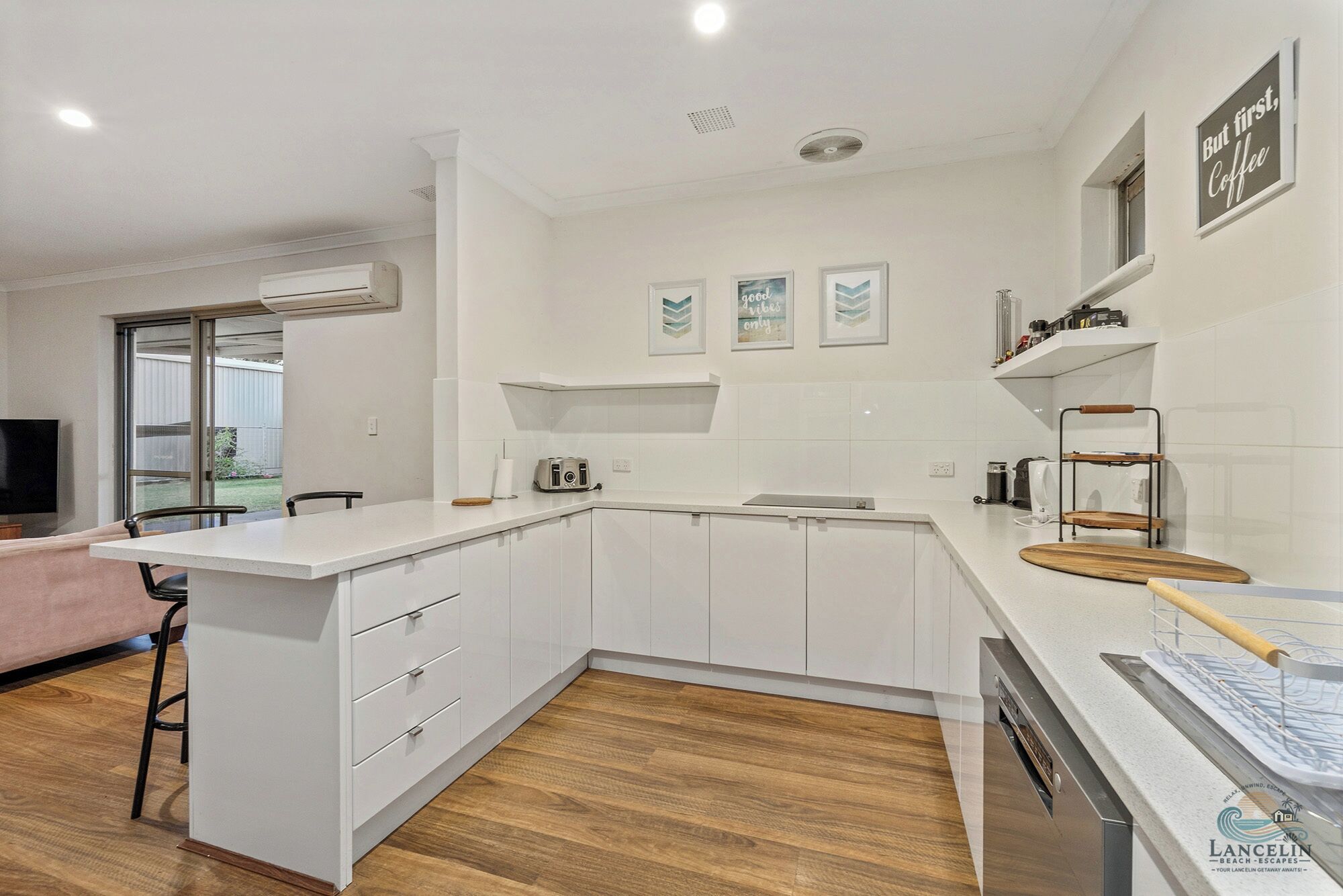 Fridge, stovetop, dishwasher, coffee/tea maker