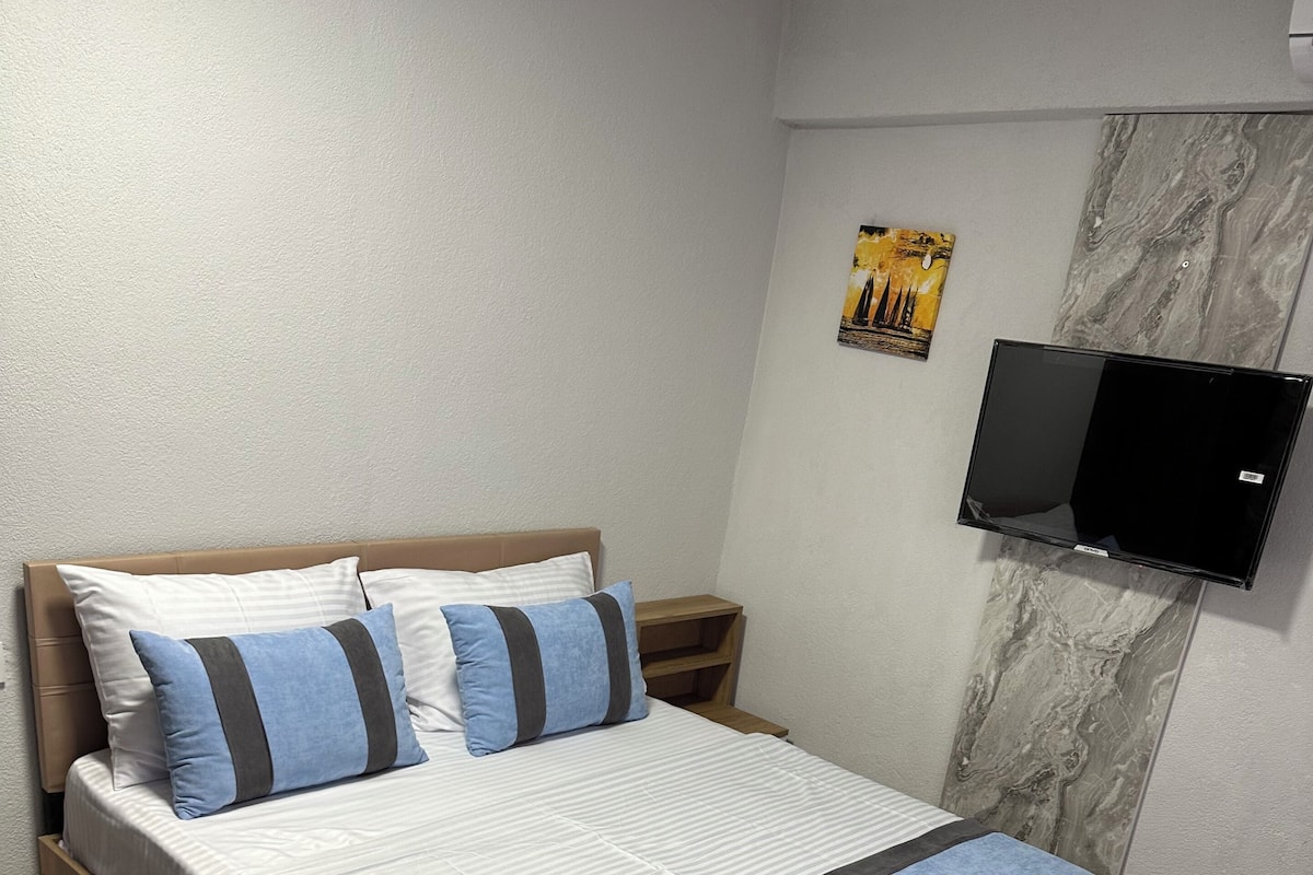 Chambre Triple Deluxe, vue partielle sur la mer
