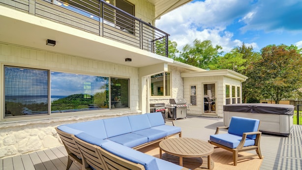 A deck with a sofa, chairs, and a table. - Byrdstown Home on 65 Acres w/ Pool, Trail to Lake! (Allons)