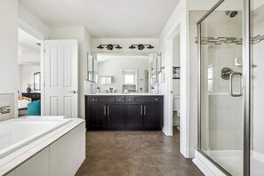 Shower, hair dryer, towels, shampoo