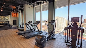 A gym with treadmills, elliptical machines, and a rowing machine. - Charles Hope Manchester Centre (Manchester)