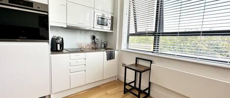 Apartment | Private kitchen | Fridge, microwave, oven, stovetop