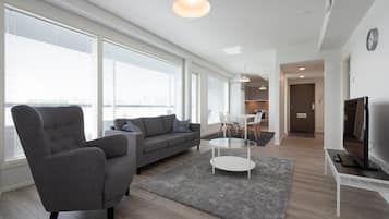 Standard Apartment | Living area | 32-inch TV with cable channels