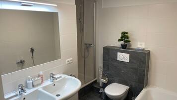 Hair dryer, towels, soap, shampoo