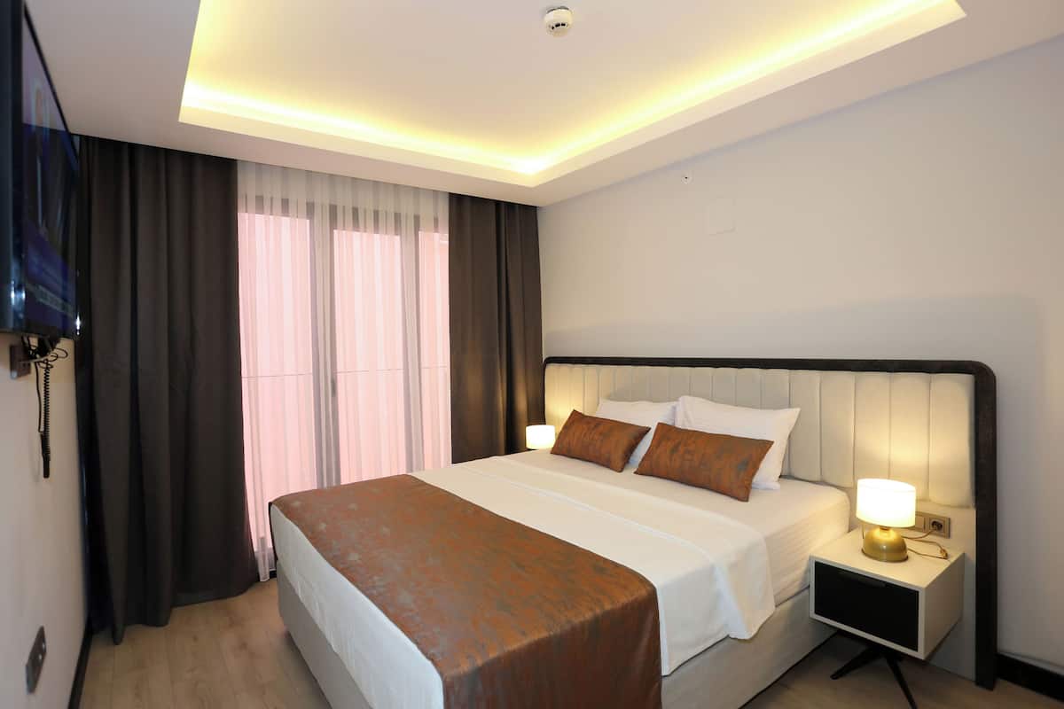 Quarto standard | Frigobar, cofres nos quartos, escrivaninha