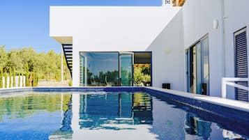 Outdoor pool, pool umbrellas, pool loungers