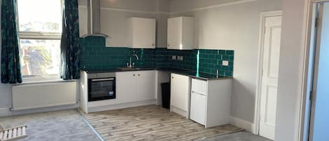 Apartment | Private kitchen | Fridge, microwave, oven, stovetop