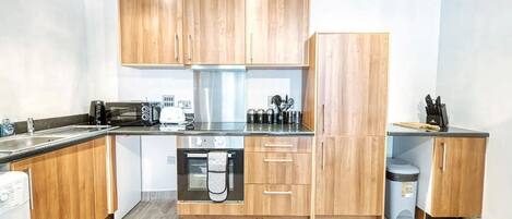 Apartment | Private kitchen | Fridge, microwave, oven, stovetop