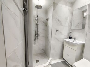 Shower, free toiletries, hair dryer, towels