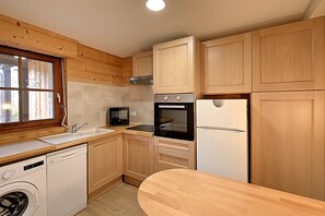 Refrigerador, microondas, horno y lavavajillas 