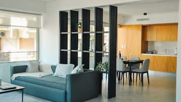 Apartment (906) | Living area | 50-inch Smart TV with cable channels, Netflix, pay movies
