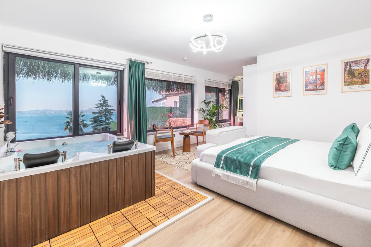 Luxury Room, Sea View | In-room safe, desk, laptop workspace, blackout curtains