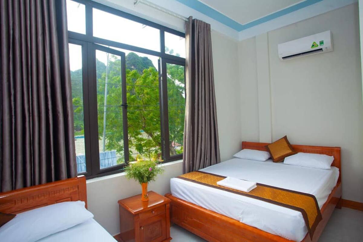 Family Room, 2 Queen Beds, Private Bathroom, River View | Desk, WiFi (free)