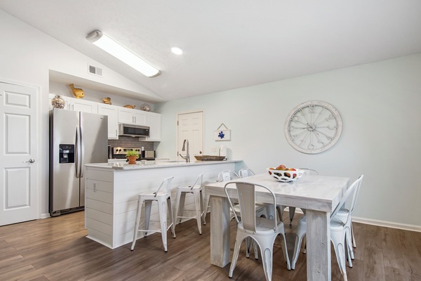 The dining and kitchen space seats 10 in all.