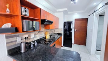 Fridge, microwave, oven, stovetop