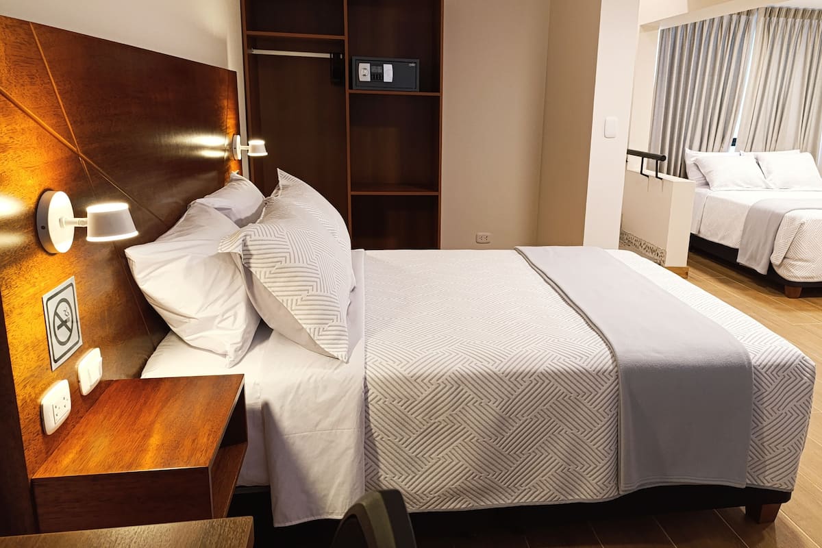 Executive Twin kamer | Een minibar, een kluis op de kamer, gratis wifi, beddengoed