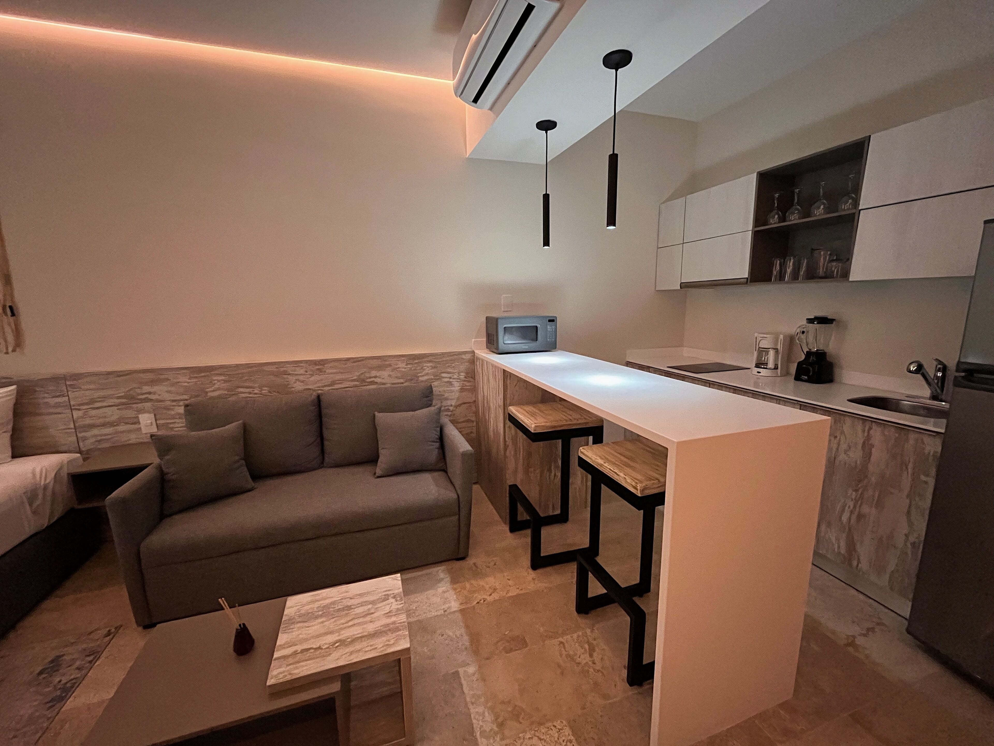 Estudio Deluxe, vista al resort | Área de sala de estar