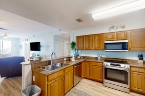 Fridge, microwave, oven, stovetop - Waterfront condo with pool & breathtaking balcony views (Gulf Shores)