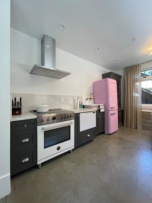 Fridge, dishwasher, dining tables