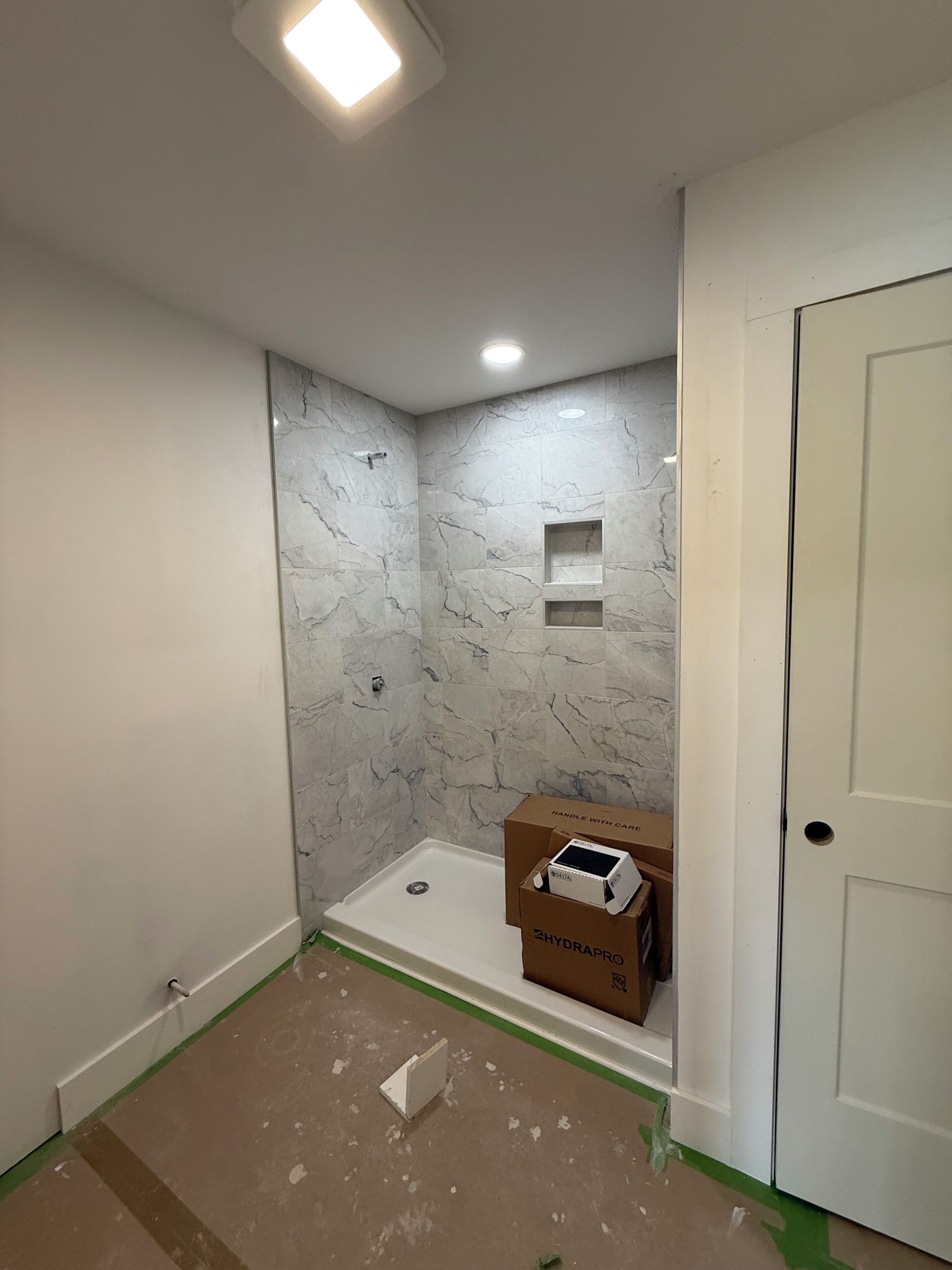 Shower, towels, soap, toilet paper