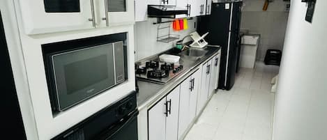 Fridge, microwave, oven, coffee/tea maker