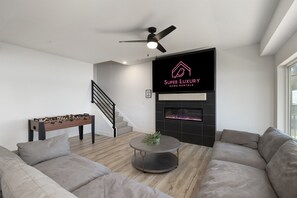Smart TV, fireplace, video games, table football