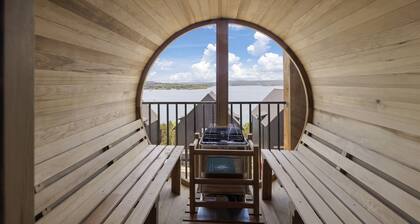 8 bdrm / 4000+ sqft home w/ golf simulator, outdoor sauna, hot tub & lake views!