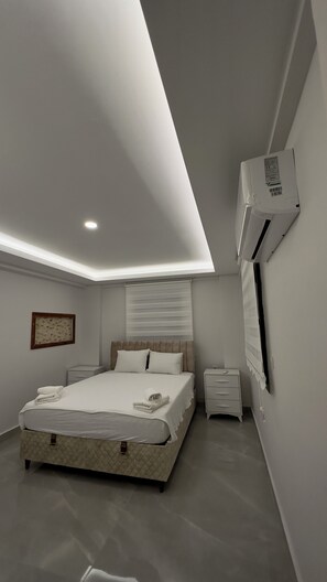 Appartement, Meerdere bedden, kitchenette, uitzicht op bergen | Donsdekens, bedden met traagschuimmatrassen, individueel gemeubileerd