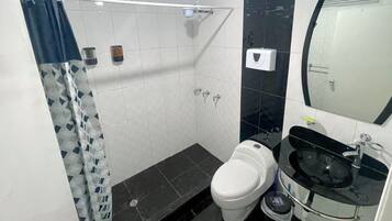 Hair dryer, towels, soap, shampoo