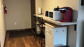 Fridge, microwave, coffee/tea maker, toaster