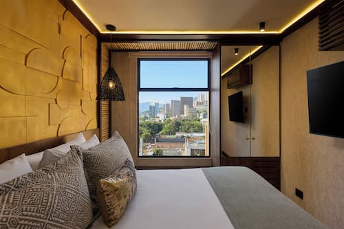 1 bedroom, hypo-allergenic bedding, down duvets, minibar