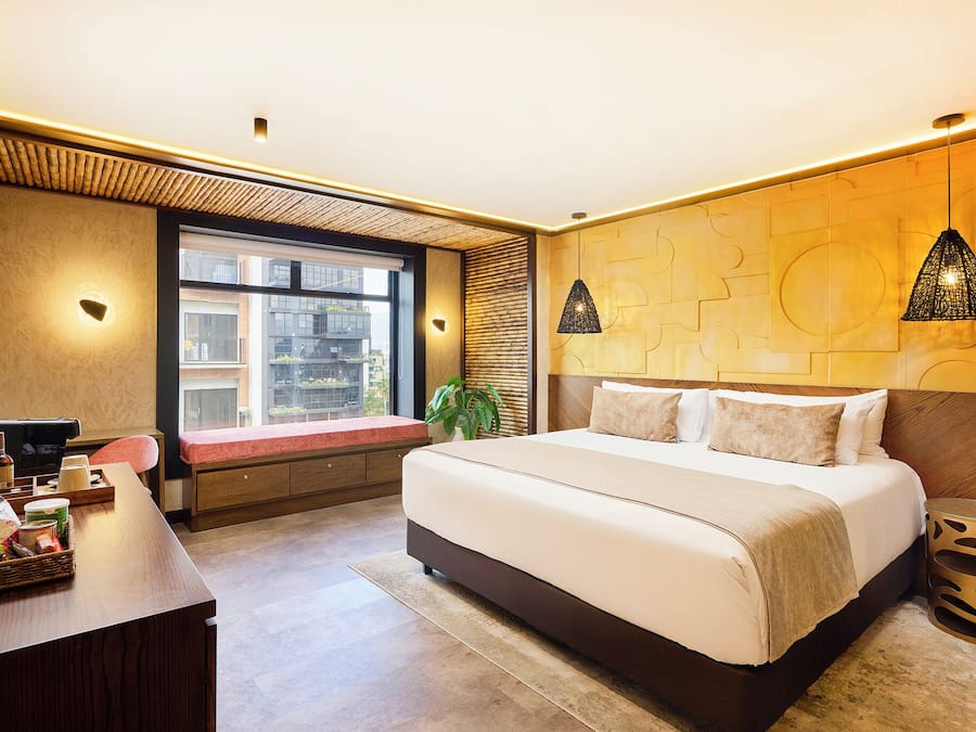 Suíte luxo | 1 quarto, roupas de cama antialérgicas, edredons de pluma, frigobar