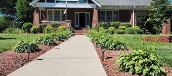 Enjoy small-town, Main Street from the front porch of this historic bungalow!
