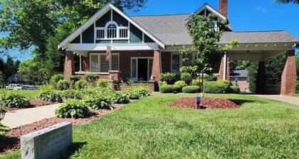 Enjoy small-town, Main Street from the front porch of this historic bungalow!