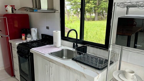 Cozy familizy-sized apartment, downstairs, with large patio - Alto Boquete