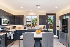 Fridge, microwave, oven, stovetop - Stylish Indio Home w/ Pool, Spa & Fire Pit (Indio)