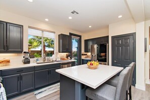 Fridge, microwave, oven, stovetop - Stylish Indio Home w/ Pool, Spa & Fire Pit (Indio)