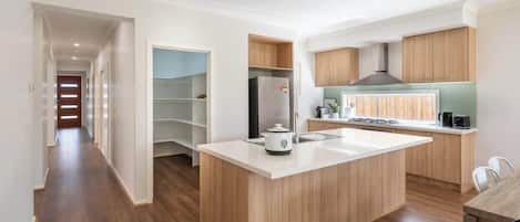 Coffee/tea maker, fridge, microwave, oven