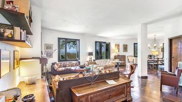 Family Villa, 3 Bedrooms, 2 Bathrooms, Mountainside (Three Lakes Villa Varese) | Living room | 21-inch TV with cable channels, fireplace, stereo