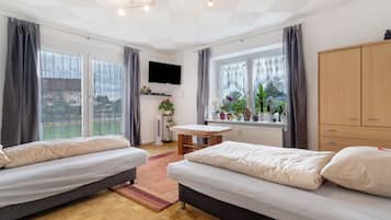 1 chambre, fer et planche Ă repasser, Wi-Fi gratuit, draps fournis