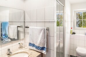 Shower, free toiletries, hair dryer, towels