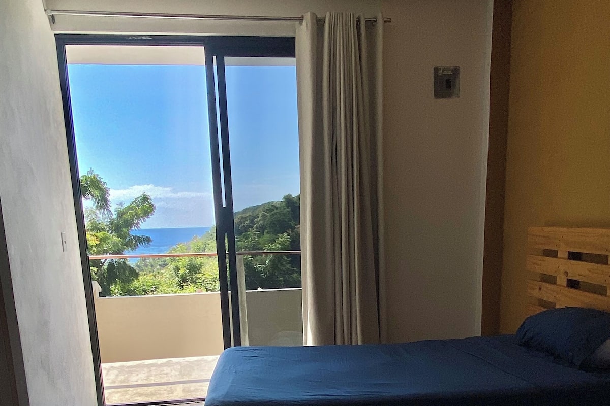 Basic Twin Room, 2 Single Beds, Partial Ocean View | Free WiFi, bed sheets
