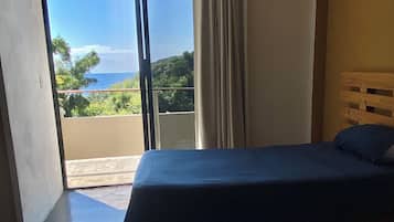 Basic Twin Room, 2 Single Beds, Partial Ocean View | Free WiFi, bed sheets