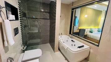 Executive Suite | Bathroom | Rainfall showerhead, hair dryer, bathrobes, slippers