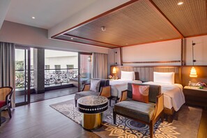 Luxe beddengoed, een minibar, een bureau, een strijkplank/strijkijzer