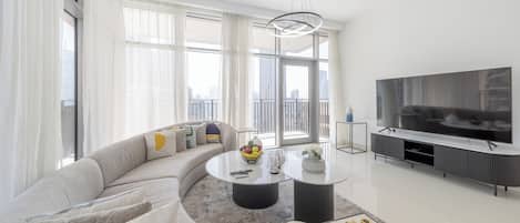 Luxury Apartment, 3 Bedrooms, Non Smoking, City View | Living area | 55-inch Smart TV with cable channels, Netflix, streaming services