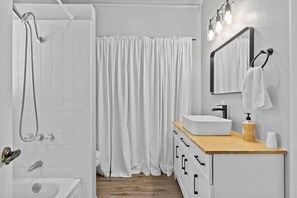 Hair dryer, towels, soap, shampoo