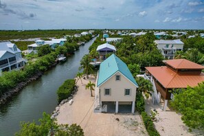 Exterior - Keys On Jamaica: 3BR Waterfront Home, Large Corner Lot on Ramrod Key, Convenient to Atlantic & Gulf! (Ramrod Key)