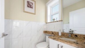 Hair dryer, towels, soap, shampoo