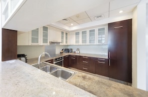 Deluxe Apartment, 2 Bedrooms, Non Smoking, City View | Private kitchen - EDEN'S Homes & Villas - BLVD central (Dubai)